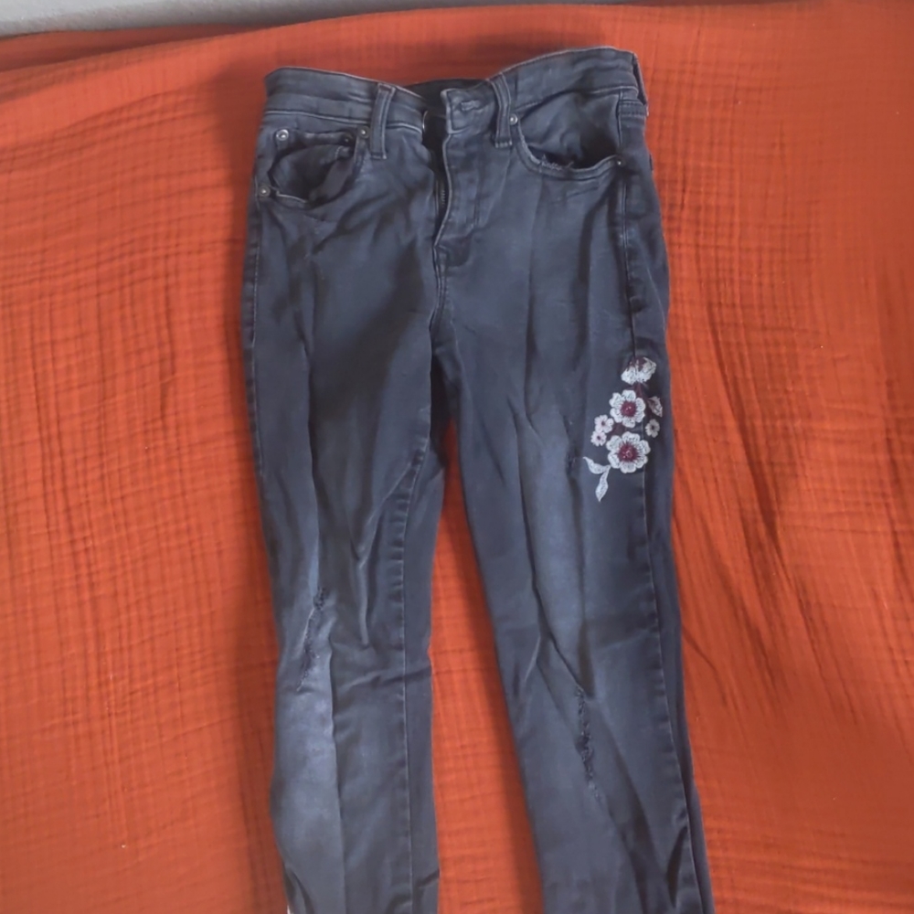high-waisted embroidered distressed black jeans